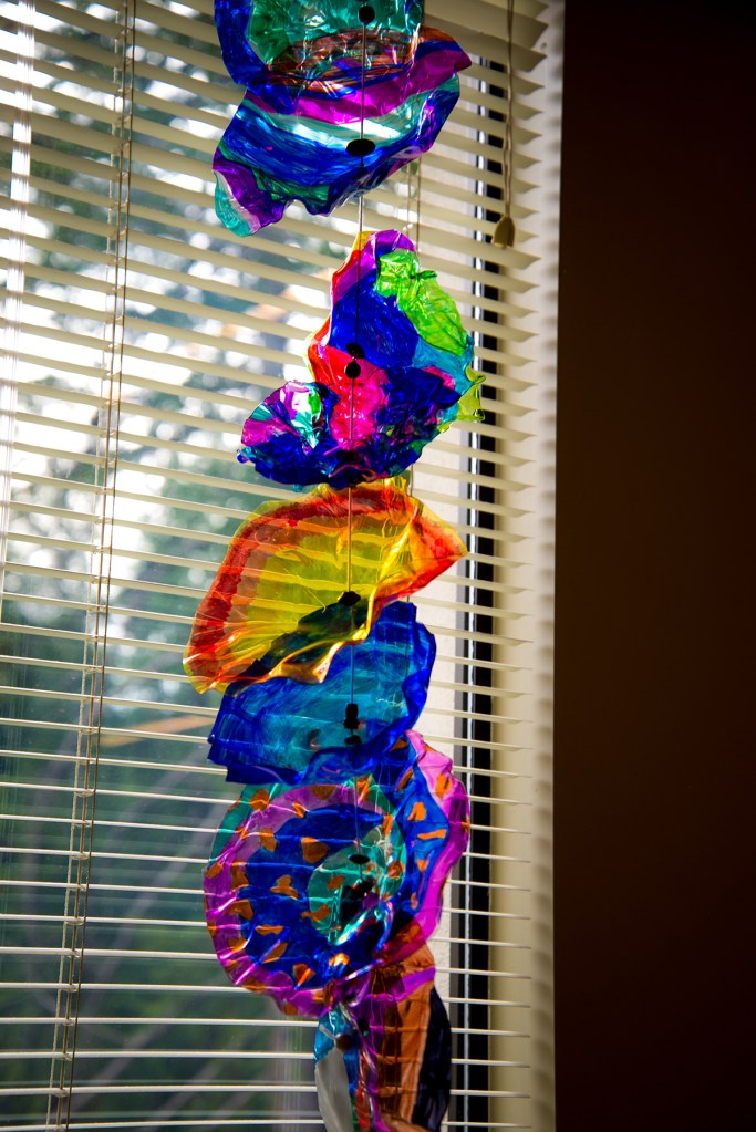 8th grade art: Students combined their bowls to create a hanging installation