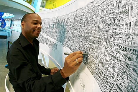 Artist Stephen Wiltshire working on one of his cityscape panoramas