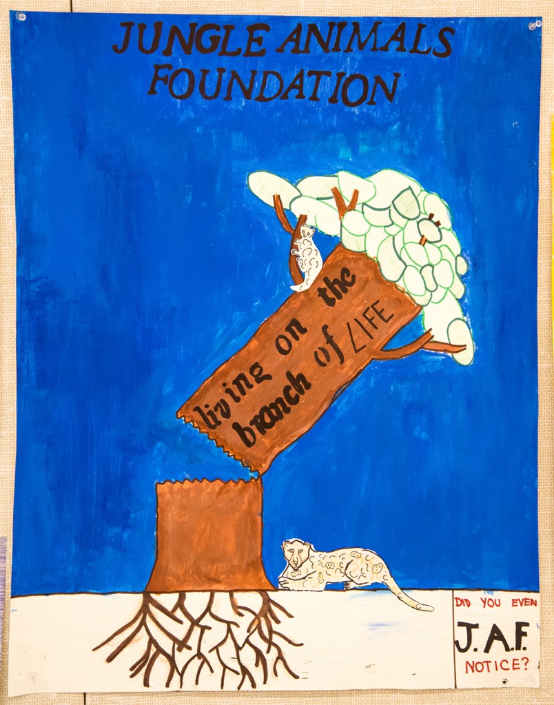 6th grade art lesson - Nonprofit organization advertisement to save jungle animals