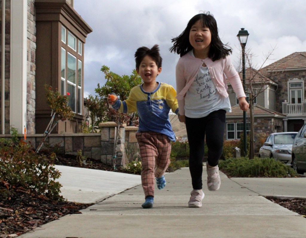 These cute kids were captured in motion by an 8th grade student