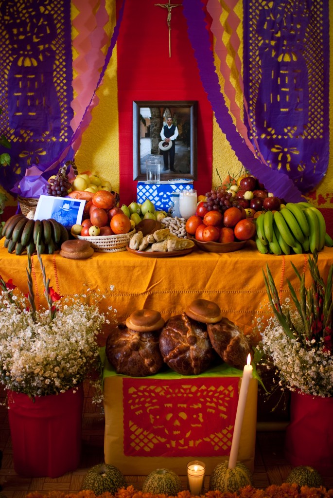 An example of an 'ofrenda' or altar of offerings for our deceased loved ones, with bread, fruit and candles