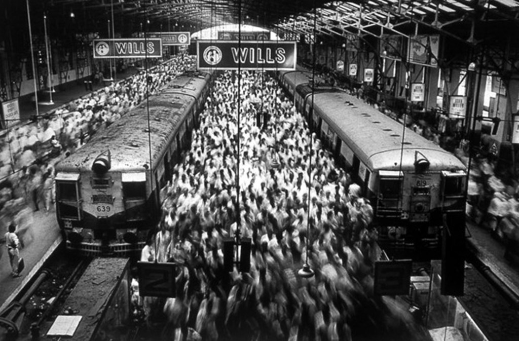 Church Street Station, 1995, © Sebastião Salgado--an image of an Indian train station capturing the blur of hundreds of people moving between the platforms