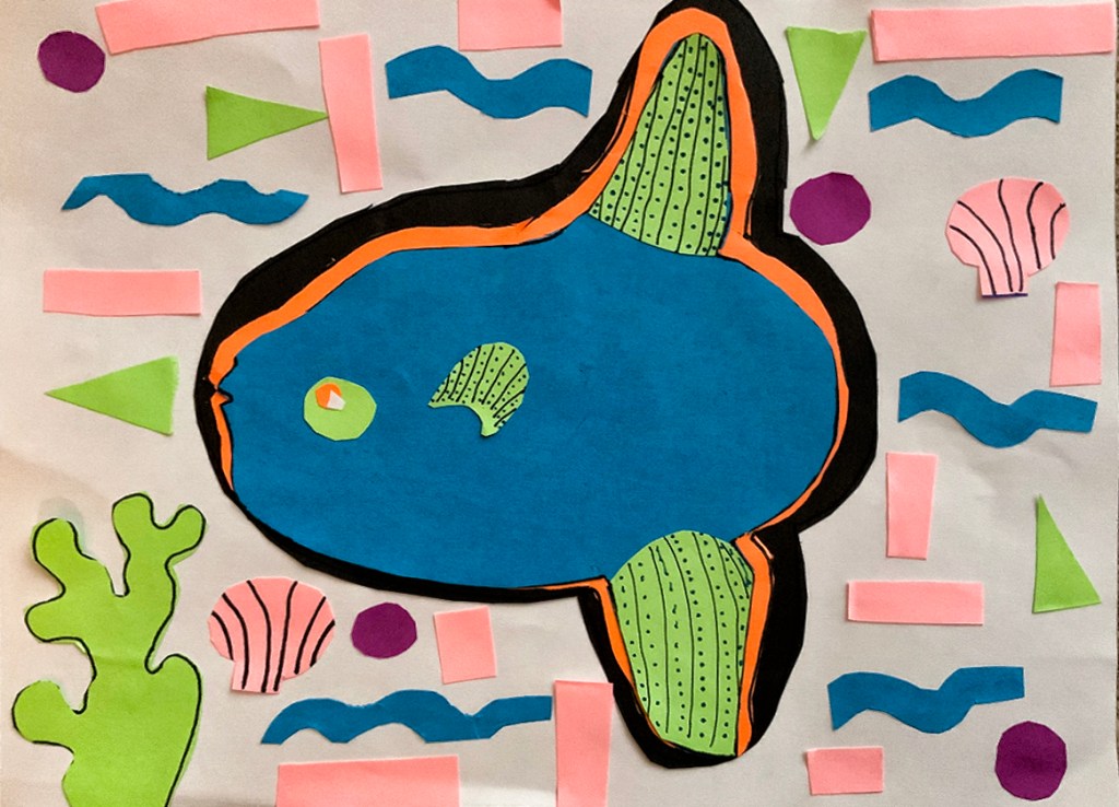 A 4th grade student Mola, depicting a blue and green fish and surrounded by geometric and organic patterns in blue, green, pink and purple.