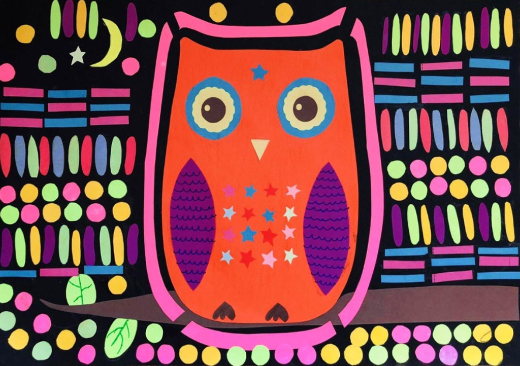 A 4th grade student Mola, depicting an orange owl that is adorned in multicolored patterns of stars, surrounded by a multicolored array of patterns in both organic and geometric shapes. 