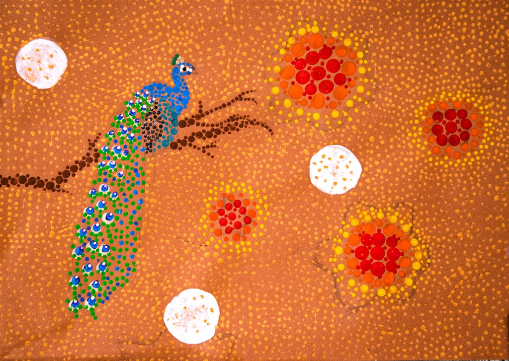 5th grade student's Aboriginal-style Dot Painting of a peacock on a branch set against circular patterns.