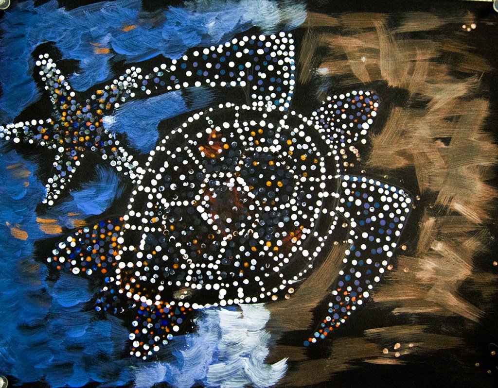 5th grade student's Aboriginal-style Dot Painting of a turtle in earthy colors.