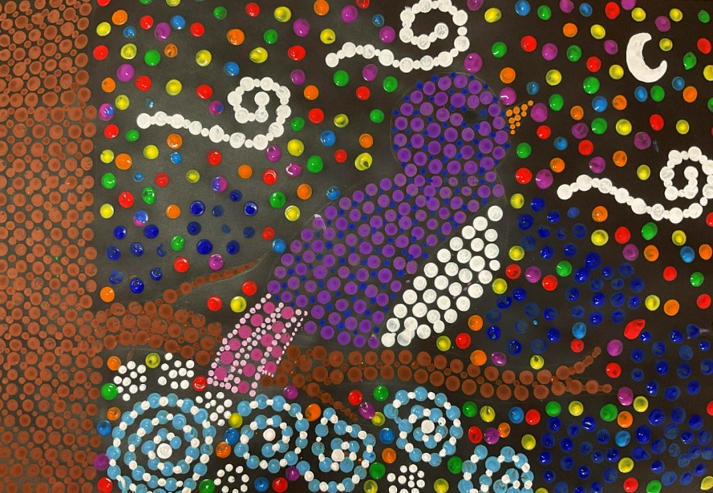 5th grade student's Aboriginal-style Dot Painting of a bird on a branch set against a sky of bright colors.