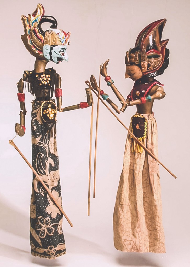 Two Wayang Golek puppets, the three-dimensional, doll-like expression of Wayang Kulit.