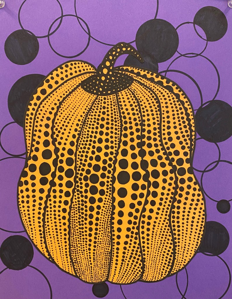 An example of a 5th grade student's Yayoi Kusama style polka-dot pumpkin on a vibrant, patterned background.