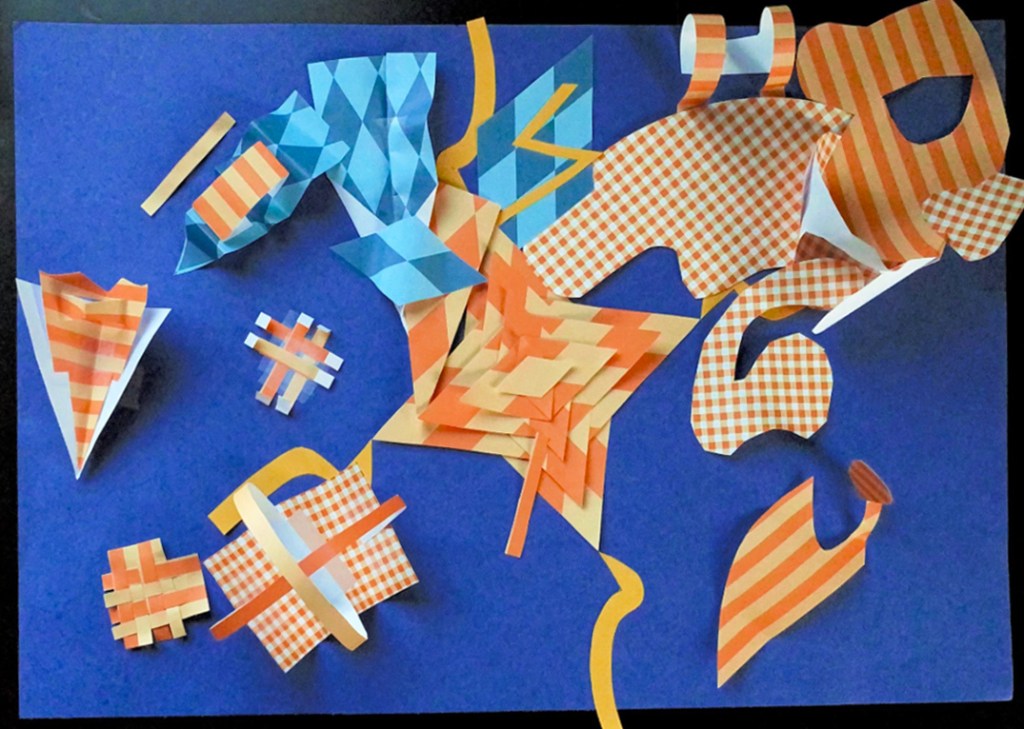 2nd grade student example of Matisse-Ray "style" Cut-out Collage with painted paper, books, magazines and other diverse stationary.