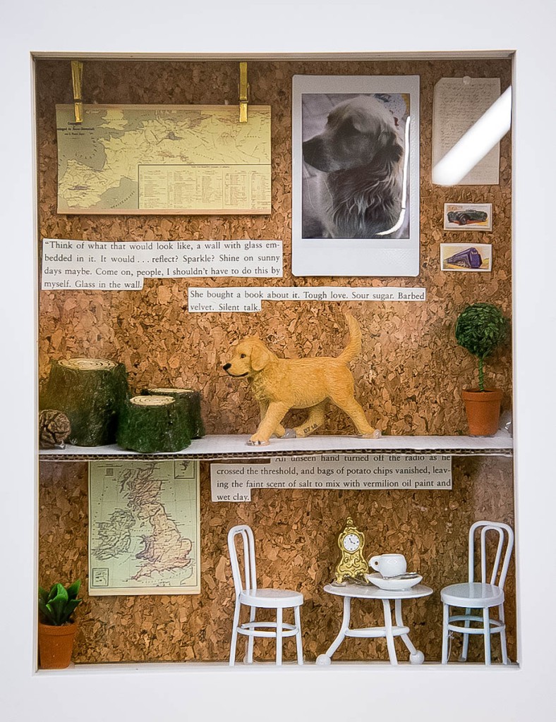 7th Grade Student's Cornell-Style Memory Box. This one contains a few doll house furniture pieces, a toy doll, a photo of a pet golden retriever, and some text from a novel.