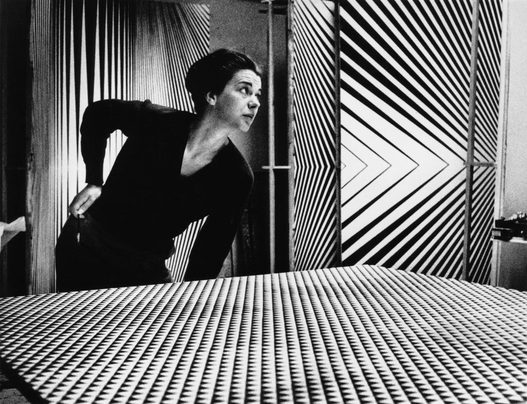 A photo of Op Art painter Bridget Riley in her studio, some time in the 60's. 