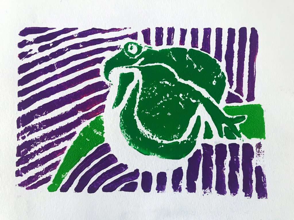 An 8th grade student's linoleum block print. A giant, full-bellied frog on a leaf with a striped purple background.