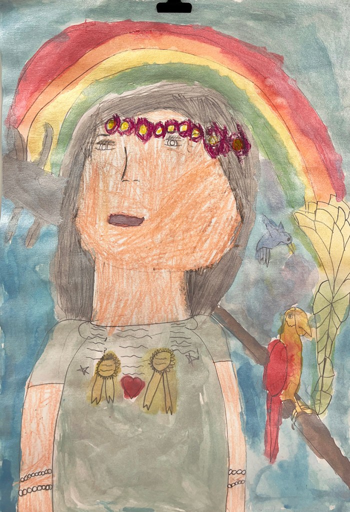 1st grade student's Frida Kahlo-inspired self-portrait. This is a little girl with a bird and parrot for spirit animals.