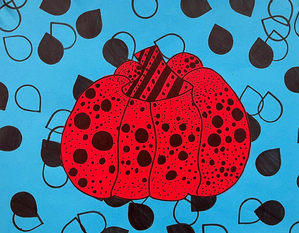 A 5th grade student's Yayoi Kusama-inspired pumpkin. A red polka-dotted pumpkin on a blue background with a pattern of drops