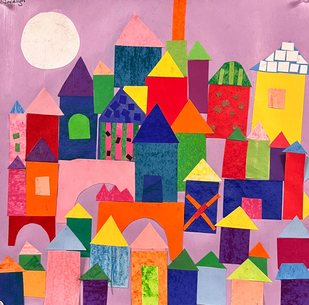 3rd grade student's cityscape mosaic made of colored shapes arranged into a collage